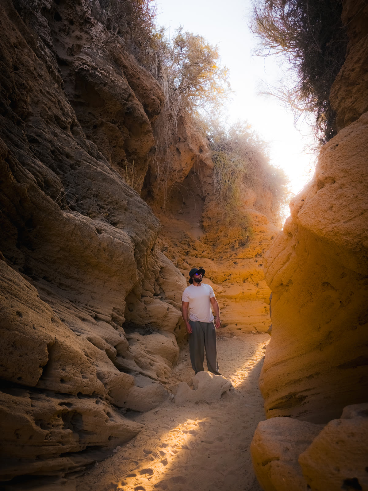 Adam in an ochre canyon